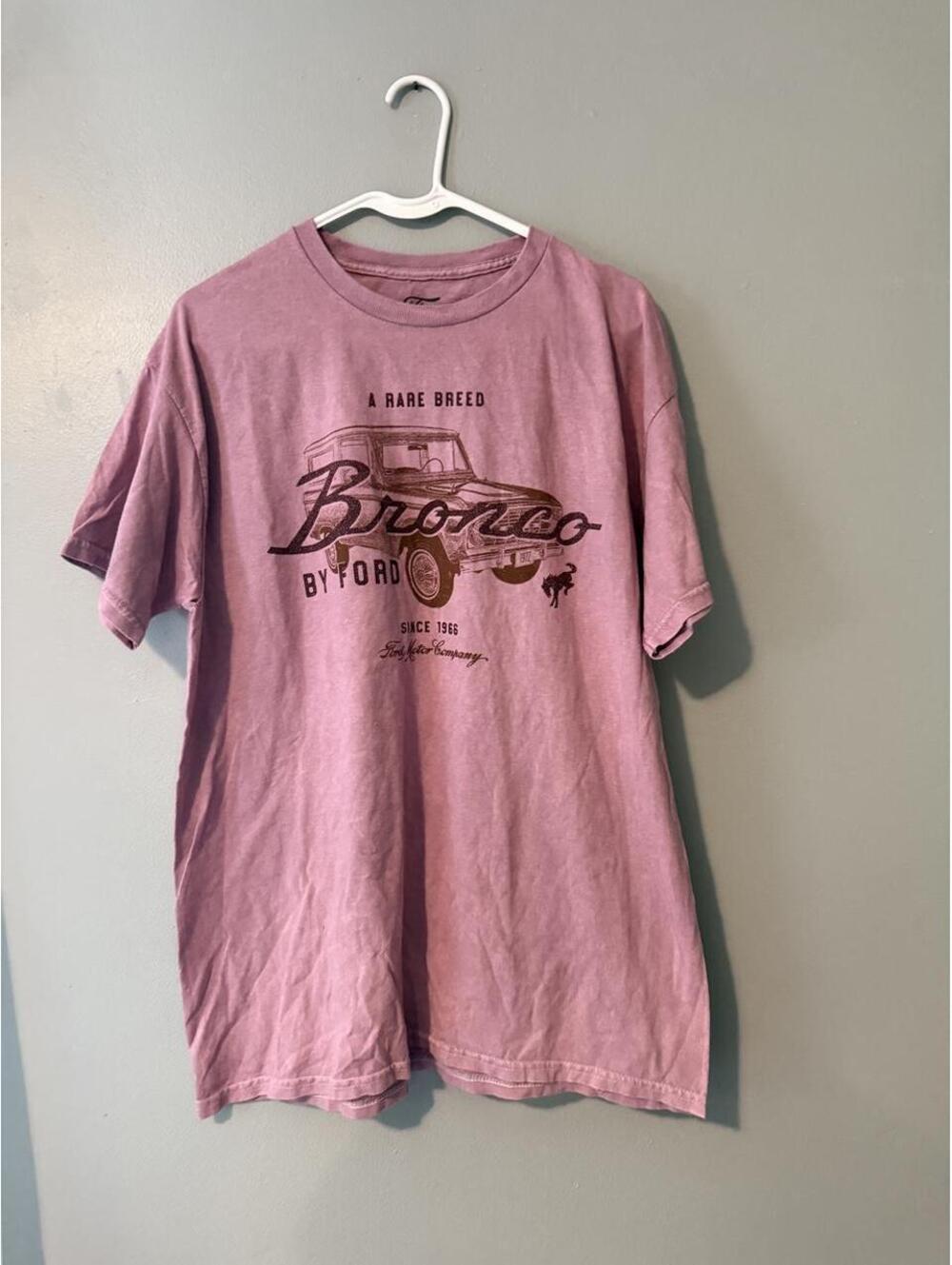 Pink Ford Bronco cotton t-shirt with graphic of a Ford Bronco truck